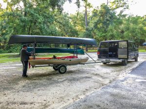 Lucas from Suwannee Canoe Rentals loads our Kayaks